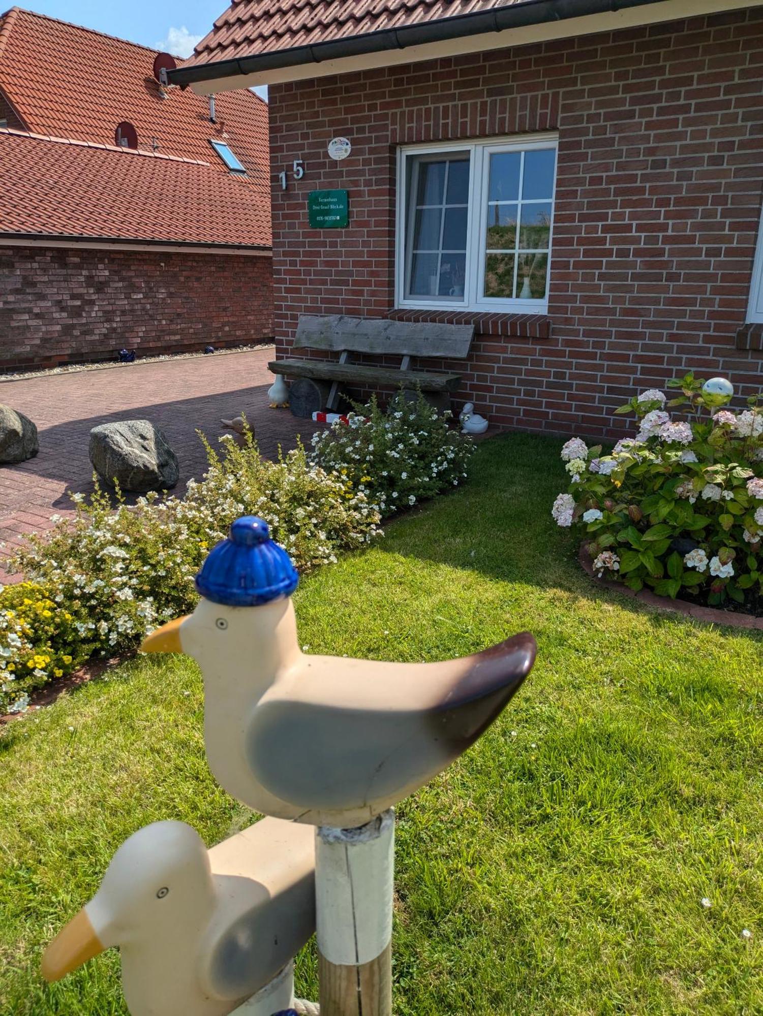 Drei-Insel-Blick Nessmersiel Exterior foto